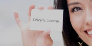 Women holding driver's license